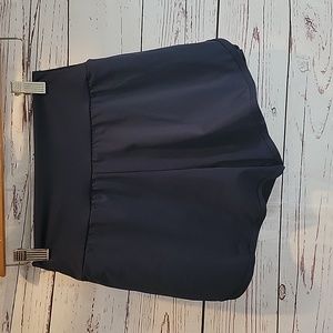 Athletic shorts with under shorts for modesty.
